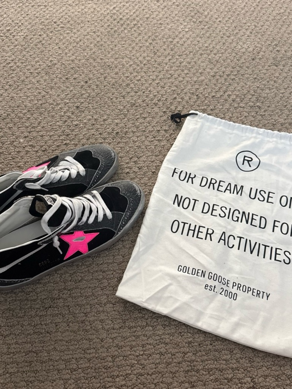 Golden Goose Women’s Black Sneakers with Pink Star Accent